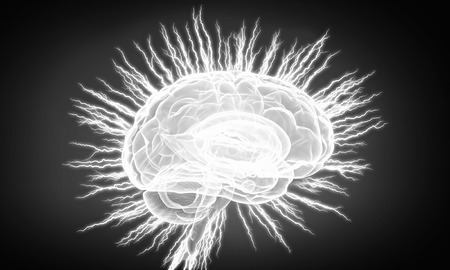 Shiny brain in between thunder lightning on dark backgroundの写真素材