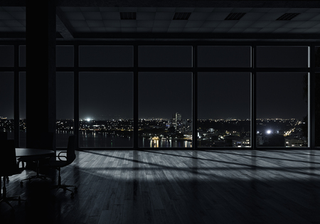 Background of office interior with night cityscapeの写真素材