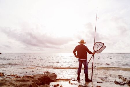 Picture of fisherman fishing with rods