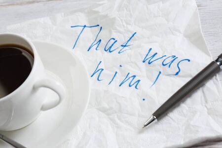 Message written on napkin and coffee cup on wooden napkinの写真素材