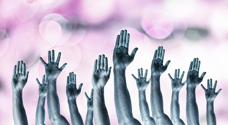 Group of people with hands up showing gesturesの写真素材