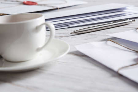 Old post concept with envelope with wax seal on wooden surfaceの写真素材