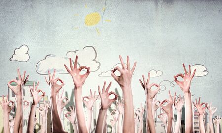 Many of people hands showing ok gestureの写真素材