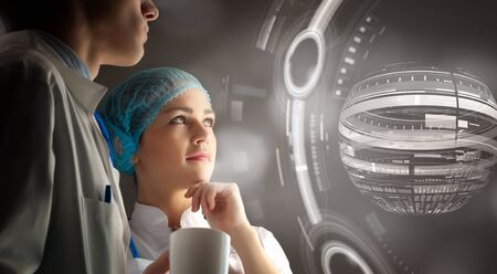 Two scientist carrying out research in laboratory