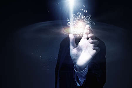 Hand of man taking with fingers 3D rendering cube figure as symbol of problem solving