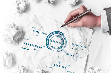 Hand drawing creative business strategy on crumpled paperの写真素材