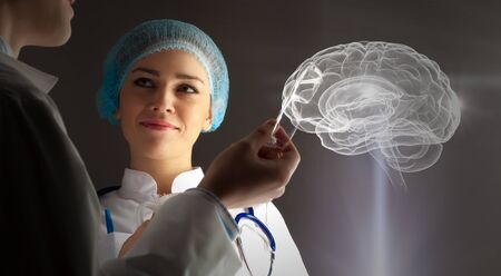 Two scientist carrying out research in laboratoryの写真素材