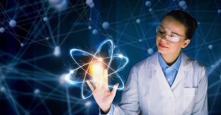 Young female doctor and modern connection technologiesの写真素材
