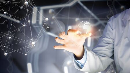 Young female doctor carrying out research in laboratoryの写真素材