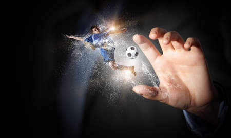 Close view of businesswoman palm and football game concept