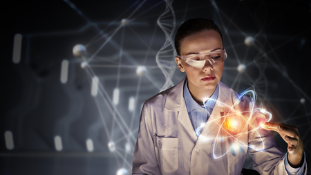 Young female doctor and modern connection technologiesの写真素材