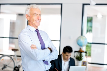 Handsome businessman at the office