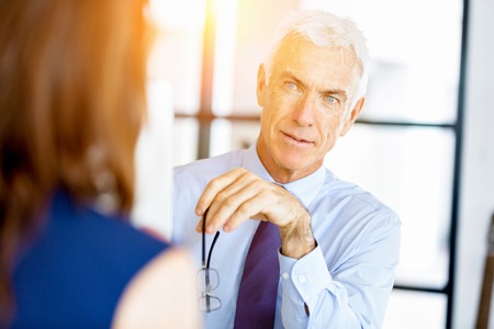 Handsome businessman at the officeの写真素材