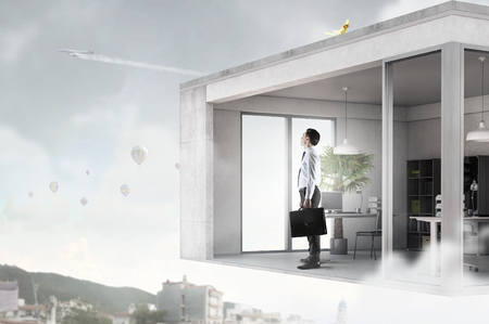 Modern interior design of room flying in air. Mixed mediaの写真素材