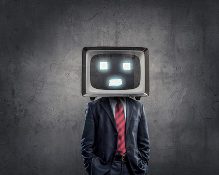Unrecognizable businessman with monitor instead of headの写真素材