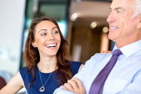 Businesspeople having meeting in modern officeの写真素材