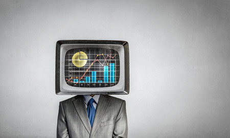 Unrecognizable businessman with monitor instead of headの写真素材