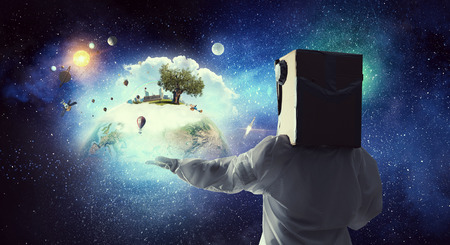 Attractive young woman wearing helmet and astronaut costume. Elements of this image are furnished by NASAの写真素材