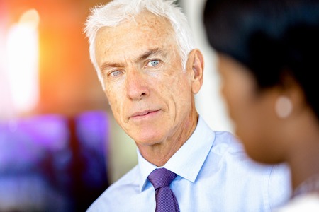 Handsome businessman at the officeの写真素材