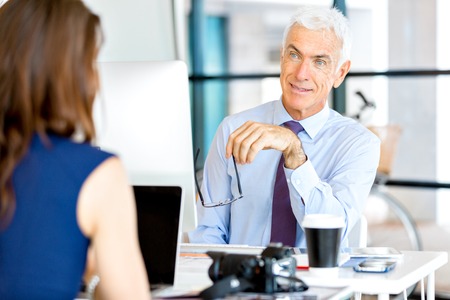 Handsome businessman at the officeの写真素材