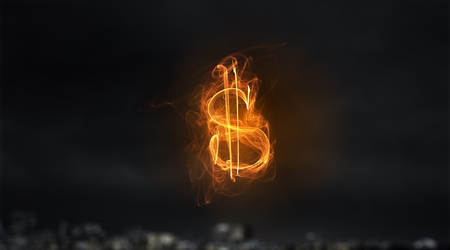 Dollar money glowing symbol on dark backgroundの写真素材