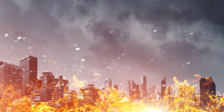 Landscape of modern city burning in fireの写真素材