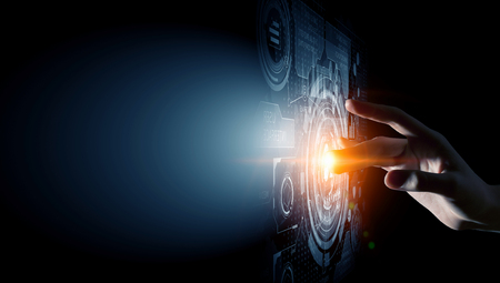 Close up of businessman touching virtual panel with fingerの写真素材
