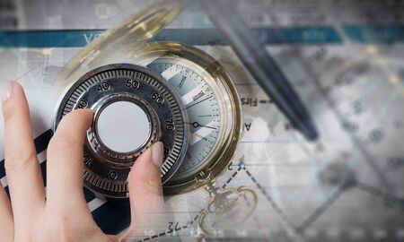 Woman open safe . Mixed mediaの写真素材