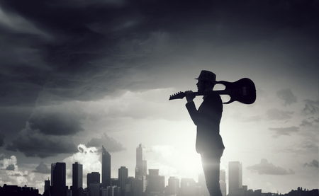 Elegant guitarist silhouette . Mixed mediaの写真素材