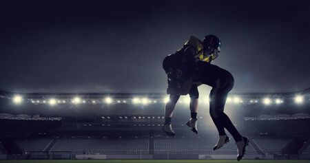 American football players at arena . Mixed mediaの写真素材