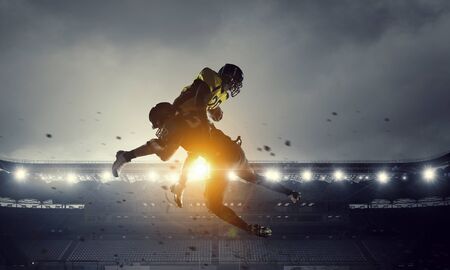 American football players at arena . Mixed mediaの写真素材