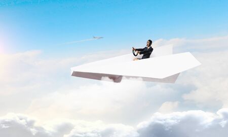 Woman Aviator floating in sky    . Mixed mediaの写真素材