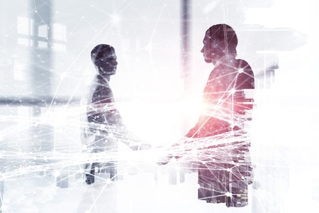 Merging with big business . Mixed mediaの写真素材