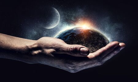 This world in our hands . Mixed mediaの写真素材