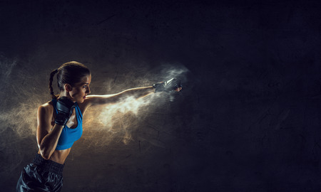 Young boxer woman . Mixed media . Mixed mediaの写真素材