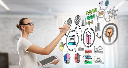 Drawing a business plan . Mixed mediaの写真素材