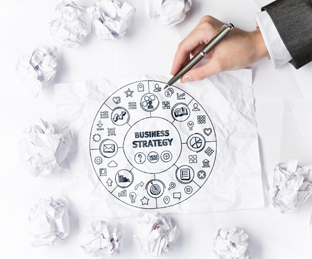 Creative idea concept with hand drawing business strategy on sheet of paperの写真素材