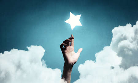Reach and touch the star . Mixed mediaの写真素材