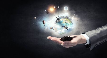 Planet Earth in our hands . Mixed media