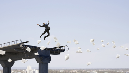 Business concept of businessman overcome the problems . Mixed mediaの写真素材