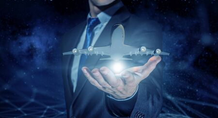 Airplane model in palm . Mixed mediaの写真素材