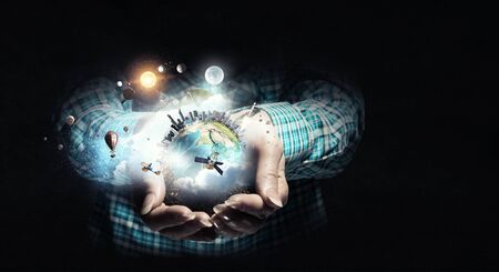 Planet Earth in our hands . Mixed mediaの写真素材