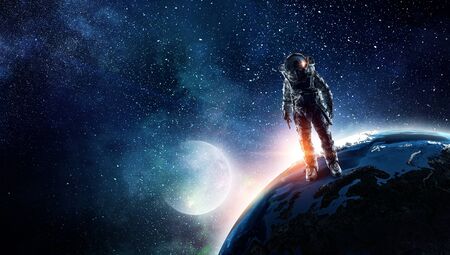 Astronaut in outer space. Mixed media . Mixed mediaの写真素材