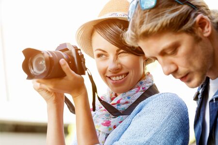 Smiling couple with the camera