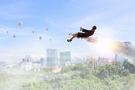 Woman riding missile. Mixed media . Mixed mediaの写真素材