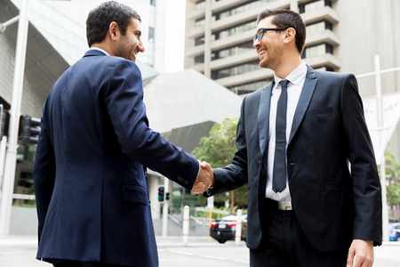 Two businessmen shaking their handsの写真素材