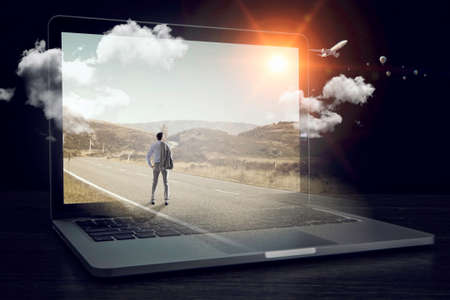 Man on huge laptopの写真素材