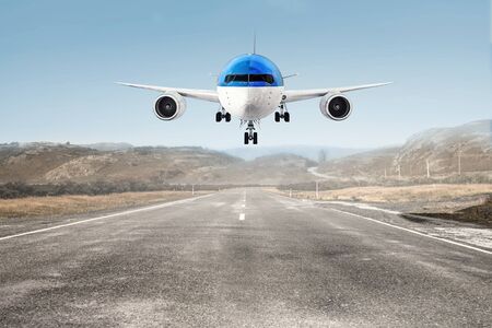 Airplane over runway. Mixed mediaの写真素材