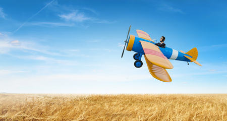 Woman in drawn airplane . Mixed mediaの写真素材