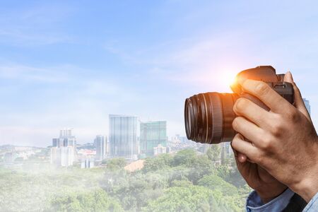Man with camera in hands